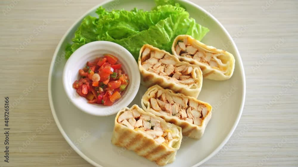Mexican Quesadilla Chicken - Tortilla wrapped chicken and mexican sauce and cheese - Mexican food style- Mexican food style Mexican Quesadilla Chicken - Tortilla wrapped chicken and mexican sauce and cheese - Mexican food style- Mexican food style