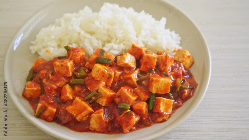 Mapo Tofu - The traditional Sichuan dish of silken tofu and ground beef, packed with mala flavor from chili oil and Sichuan peppercorns - Asian food style Mapo Tofu - The traditional Sichuan dish of silken tofu and ground beef, packed with mala flavor from chili oil and Sichuan peppercorns - Asian food style