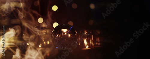 Fotografie, Obraz Abstract background with smoke ball and candles