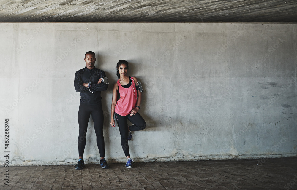 Obraz premium They love staying fit together. Shot of a sport young couple out for a run.
