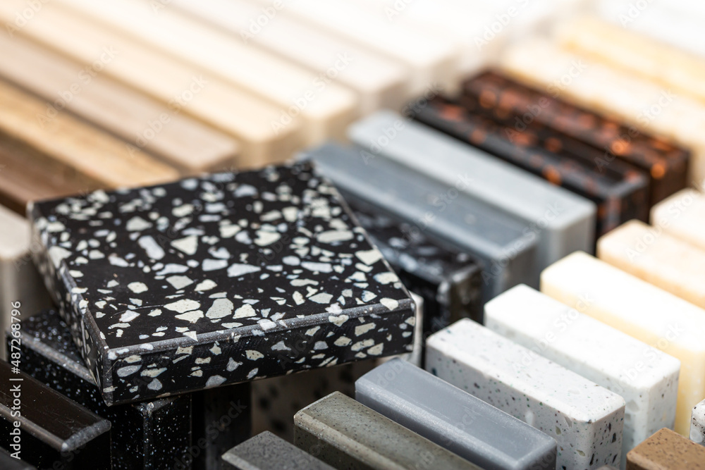 A set of samples of stones for decorative interior decoration. Beautiful set of marble and granite with stains, onyx surface. Finishing stone for furniture and interior. A set of samples of stones for decorative interior decoration. Beautiful set of marble and granite with stains, onyx surface. Finishing stone for furniture and interior.