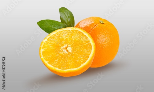 Fresh half of orange on the desk. healthy food.