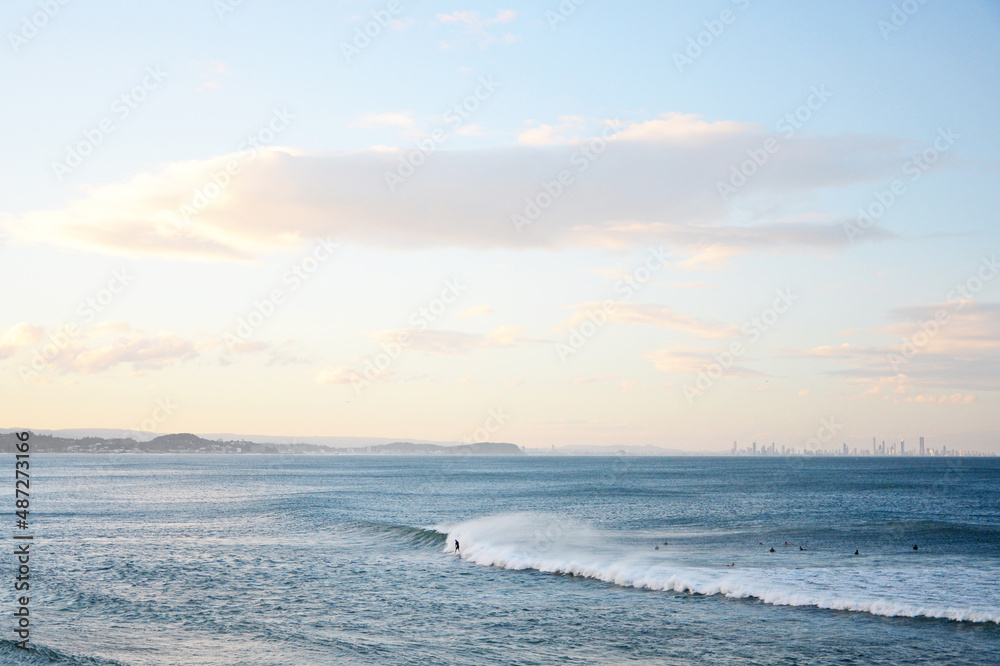 People surfing in Rainbow Bay, Gold Coast, Australia