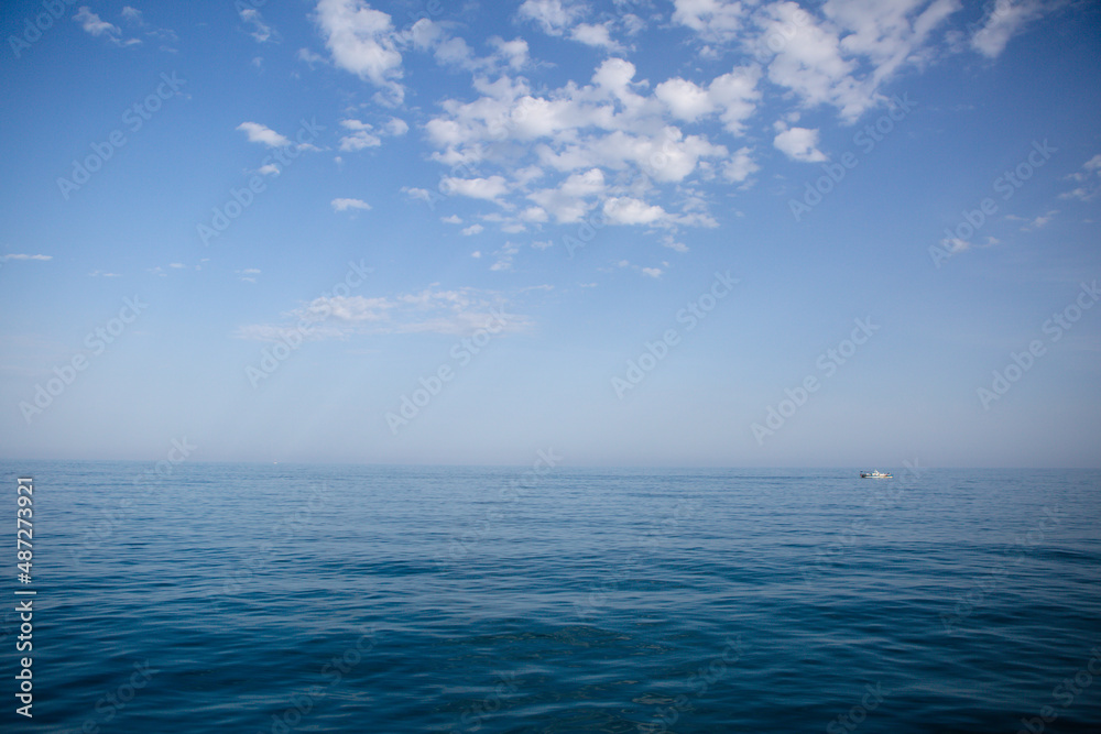 View of the blue sea and the sky beyond the horizon