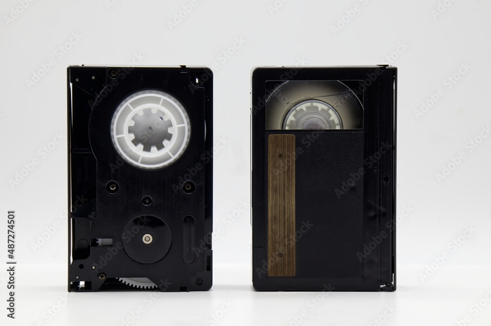 Vintage Mini DV video tape cassette isolated on white background. Retro style technology from the 90s