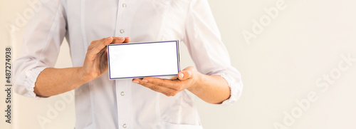 Doctor hand showing drug boxes at Office Desktop. Health care, Medical Concept. photo