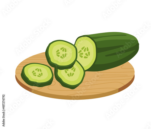 Cucumber slices cut on a wooden board