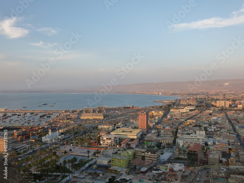 Photograph taken on a sunny day around Arica City at Chili, showing the architecture and colours of this historical place. Streets, beach, cemetery, desert, houses, square. © Mati Olivieri Stock