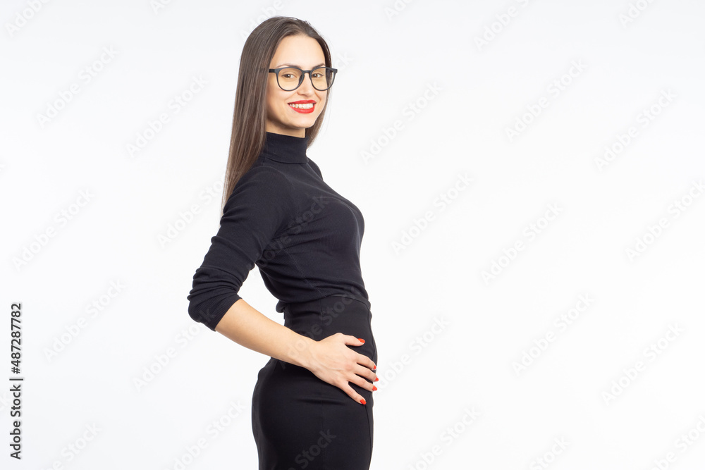 Successful woman. Business lady with glasses. Successful woman is looking at camera. Girl in black tight dress. Beautiful business lady on white. Happy girl smiling. Cheerful female model