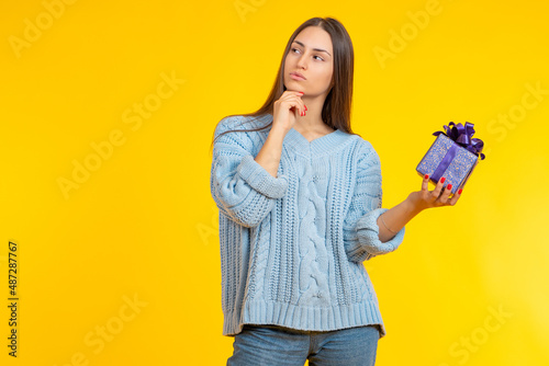 Woman with gift. Small gift...