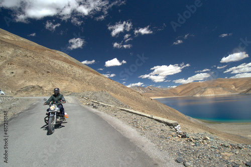 Biking on the way to Pangong Tso lake on India-China border in the Ladakh region of India.