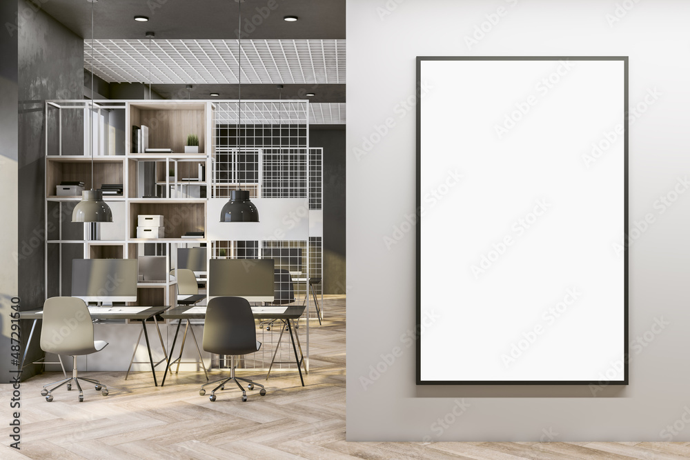 Blank white poster in black frame with copyspace for your logo on light wall in co-working office with modern design workspaces, light parquet floor, metallic decorated partitions. 3D rendering Blank white poster in black frame with copyspace for your logo on light wall in co-working office with modern design workspaces, light parquet floor, metallic decorated partitions. 3D rendering