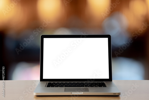 Laptop with blank screen,blurred background 