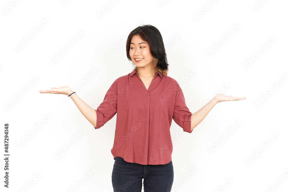 Showing Two Product on Open Palm Of Beautiful Asian Woman Isolated On White Background Showing Two Product on Open Palm Of Beautiful Asian Woman Isolated On White Background