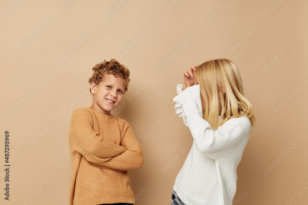 Little boy and girl hug entertainment posing friendship childhood unaltered Little boy and girl hug entertainment posing friendship childhood unaltered