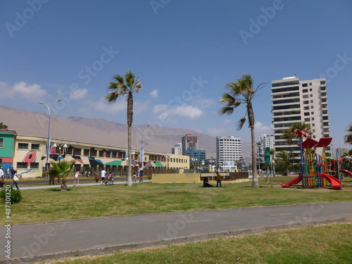 Photograph taken on a sunny day around Iquique City at Chili, showing the architecture and colours of this historical place. The port, streets and the desert.