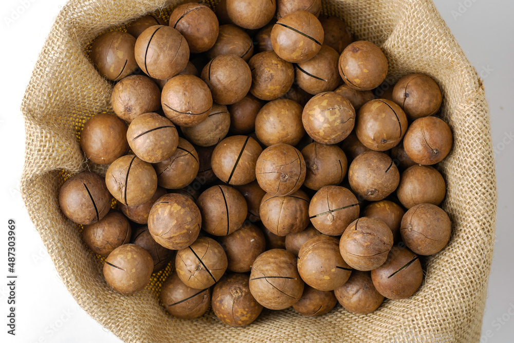 a canvas bag of macadamia nuts close-up a canvas bag of macadamia nuts close-up
