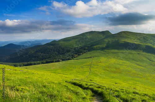 Fototapeta Naklejka Na Ścianę i Meble -  Green Bieszczady, View from Bukowe Berdo sunny day, Spring in the mountains