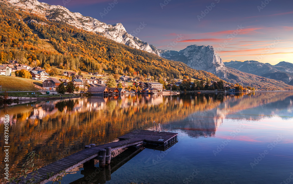 Amazing mountain landscapes with fairy-tale lake during sunset in Grundlsee village. Austrian Alps, Europe