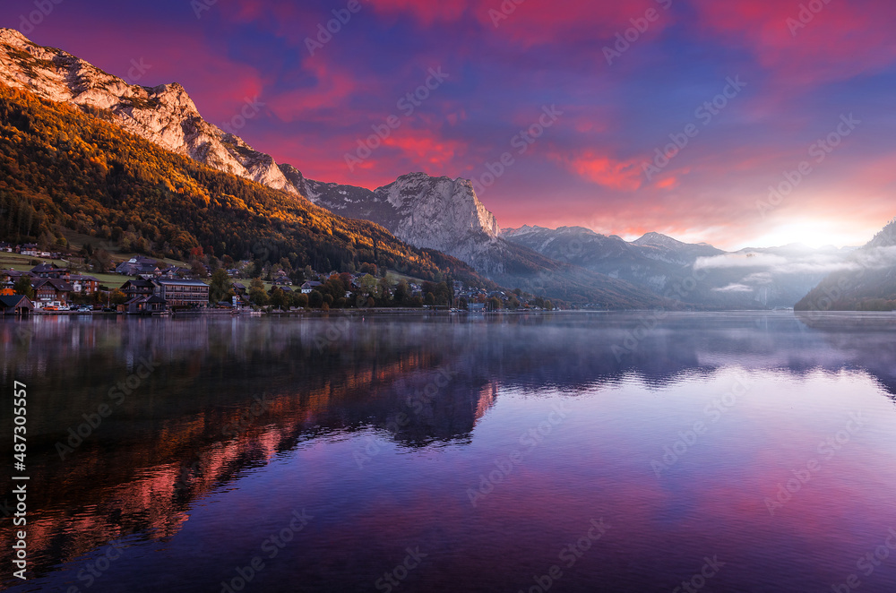 Fantastic Colorful Landscape. View on Fairy-tale lake in Alpine mountains. Picturesque sky over the highlands. Grundlsee lake. Picture of wild area, instagram filter. Creative image
