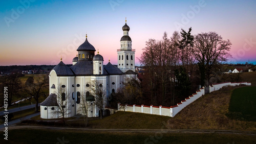 Maria Birnbaum pilgrimage church near the village of Sielenbach in Bavaria seen from above on a cloudless evening photo