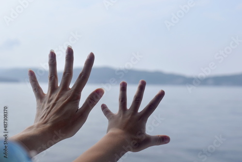 hands on sky background