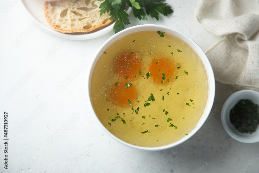 Traditional homemade chicken broth with vegetables Traditional homemade chicken broth with vegetables