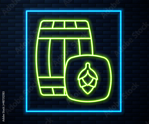 Glowing neon line Wooden barrel icon isolated on brick wall background. Alcohol barrel, drink container, wooden keg for beer, whiskey, wine. Vector