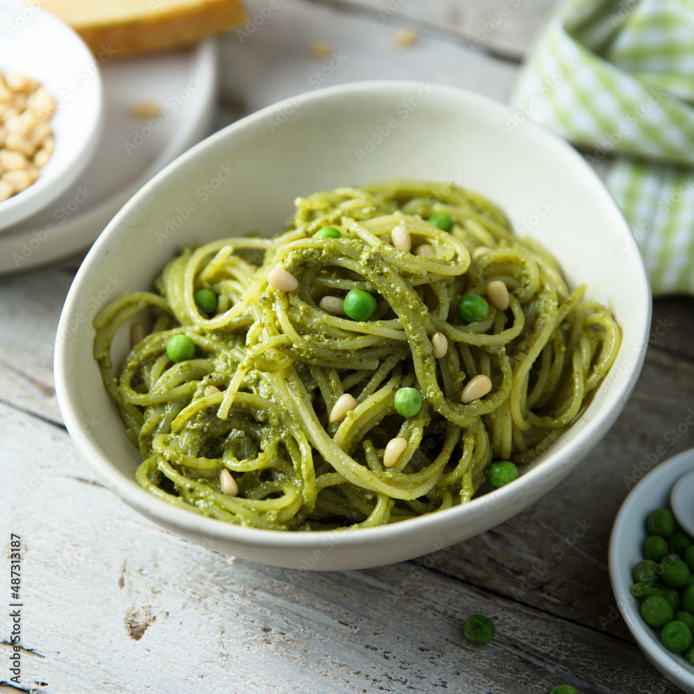 Spaghetti with pesto sauce and green pea Spaghetti with pesto sauce and green pea