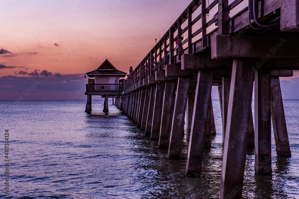 pier jetty at sunset in Naples, forida, usa