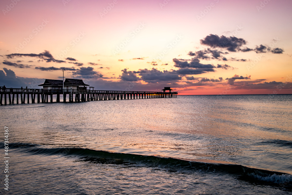pier jetty at sunset in Naples, forida, usa