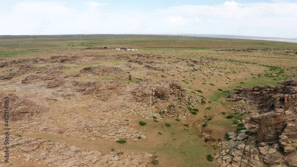 Aerial view of Baga Gazriin Chuluu, rocky desert in Gobi, Mongolia. Aerial view of Baga Gazriin Chuluu, rocky desert in Gobi, Mongolia.