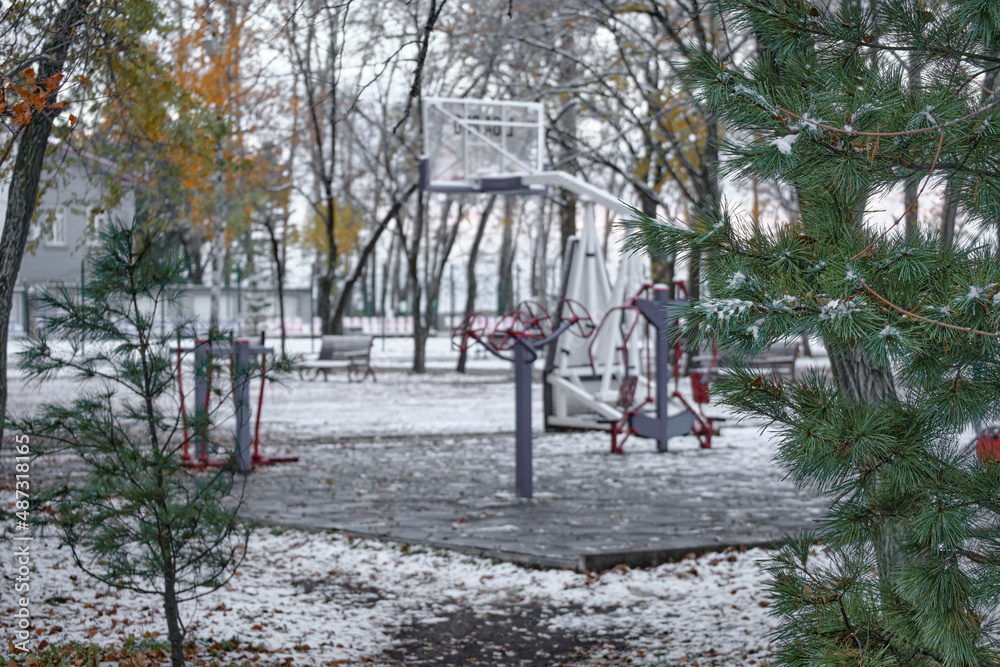 The first snow in Khabarovsk, Russia. Embankment in the snow. The first snow in Khabarovsk, Russia. Embankment in the snow.