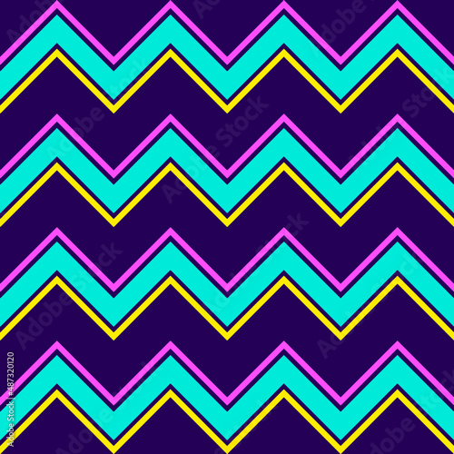 Colorful chevron seamless repeat pattern. Zig zag, spiky wavy lines in 90s neon colors. Dark blue background. Backdrop texture for posters, cards, scrapbooking, fabric, wrapping paper.
