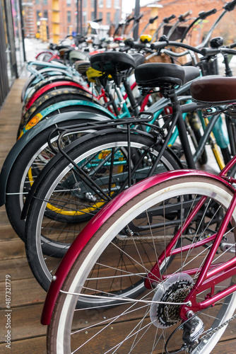 Walking bikes in the parking lot. Healthy lifestyle, cycling to work.