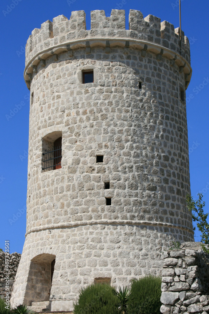 ancient tower in the old town of Cres, island Cres, Croatia