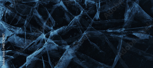 Fotografie ice texture cracks baikal, abstract background winter ice transparent blue
