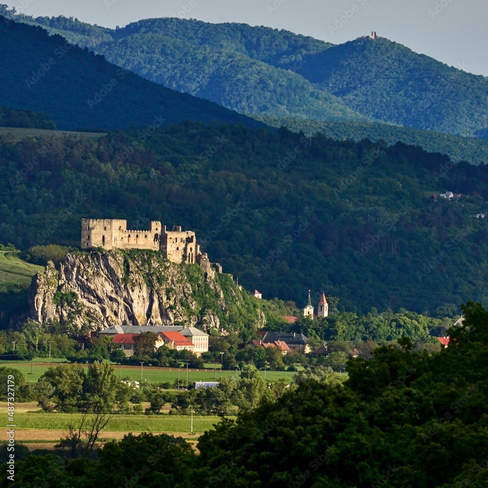 Beckov Slovak Castle in the background with the protruding Tematin Castle and the surrounding spring nature during the sunny evening