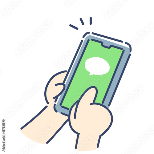 スマホを操作する手　メッセージアプリを使用するイメージ