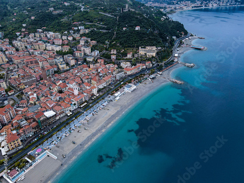 Aerial view of Noli, a beautiful small village in Liguria, north Italy. Drone photography of the Ligurian coast, province of Savona, near Spotorno and Bergeggi. Birds eye of Capo Noli and Monte Ursino