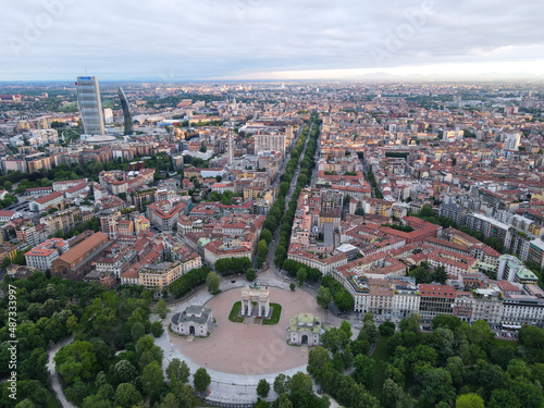 Aerial view of Arco della Pace in Milano, north Italy. Drone photography of Arch of Peace in Piazza Sempione, near Sempione park in the heart of Milan, Lombardy and Sforza Castle.