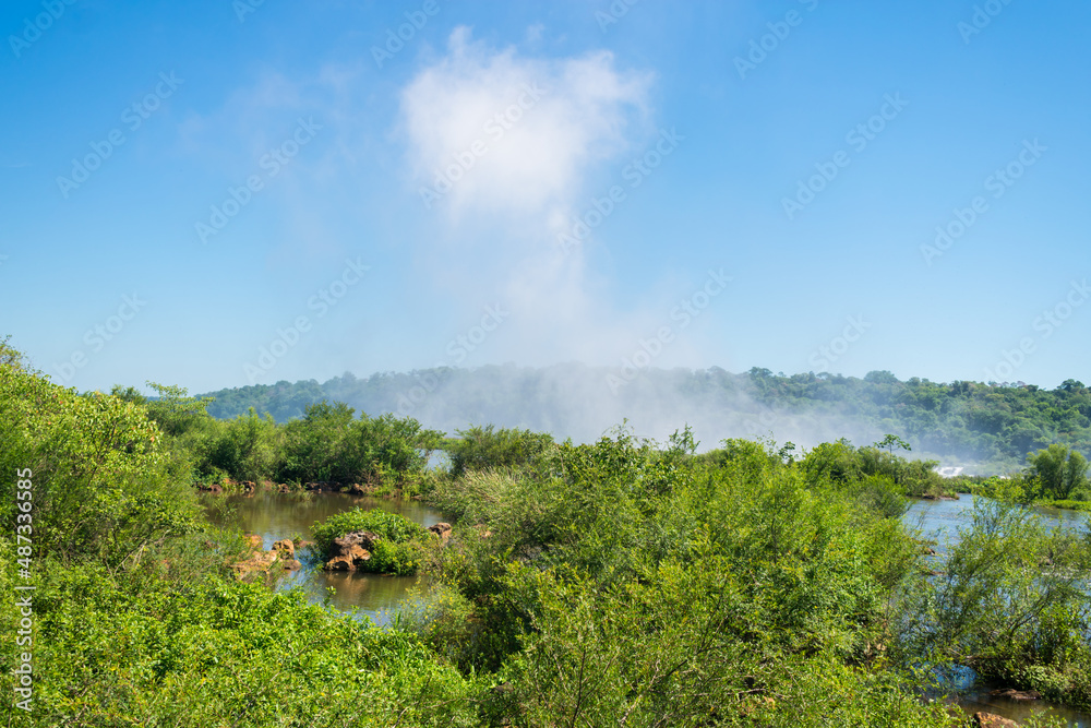 A view of the mist from the Devil's Throat waterfall at the Iguazu National Park in Puerto Iguazu, Argentina A view of the mist from the Devil's Throat waterfall at the Iguazu National Park in Puerto Iguazu, Argentina