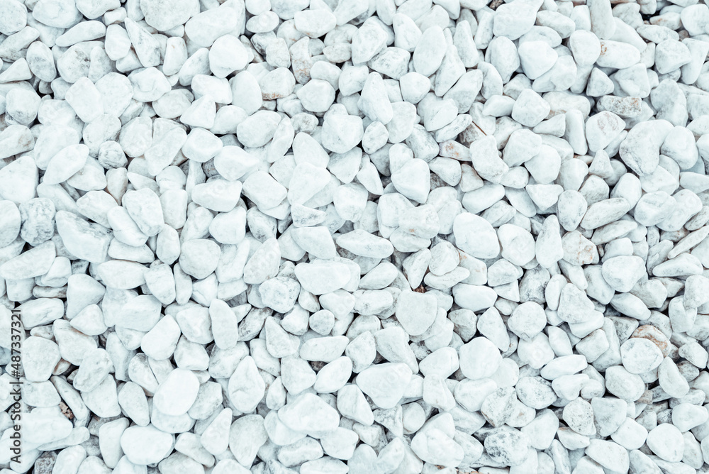 Clean White Pebbles texture. Small stones on the ground. Top view. backdrop Clean White Pebbles texture. Small stones on the ground. Top view. backdrop