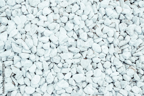 Clean White Pebbles texture. Small stones on the ground. Top view. backdrop