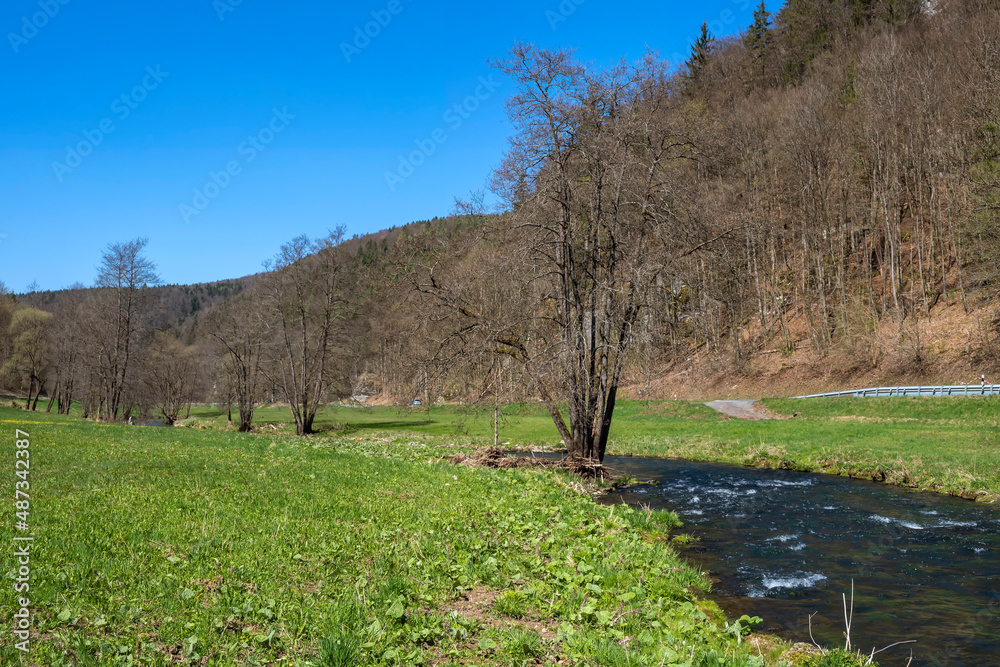 The small river Wiesent in its tranquil valley in spring in Franconian Switzerland/Germany The small river Wiesent in its tranquil valley in spring in Franconian Switzerland/Germany