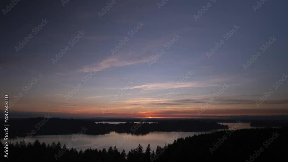 Beautiful high clouds reflecting in dark waters, epic golden sunset, aerial hyper lapse Beautiful high clouds reflecting in dark waters, epic golden sunset, aerial hyper lapse