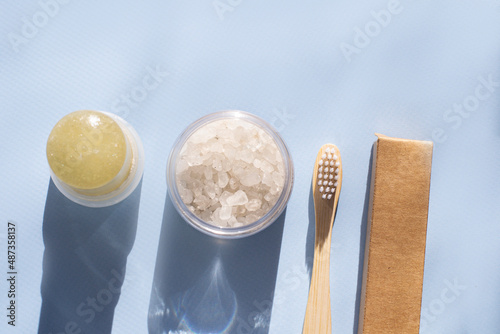 Wallpaper Mural Crystal deodorant, bamboo toothbrush, sea salt on a blue background. Beauty routine ecological set. Torontodigital.ca