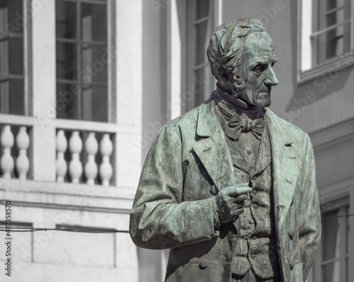 Bronze portrait of Alessandro Manzoni in San Fedele Square.Milan, Italy. photo