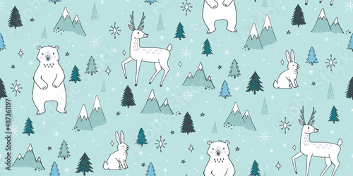 Seamless vector pattern featuring woodland animals in a pretty winter scene. Hand-drawn arctic animals with mountains, trees, snow, and stars. Perfect for winter holidays.