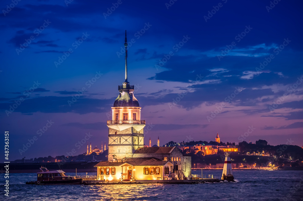 Istanbul Bosporus, a panorama , ships and Maiden's Tower at sunset.